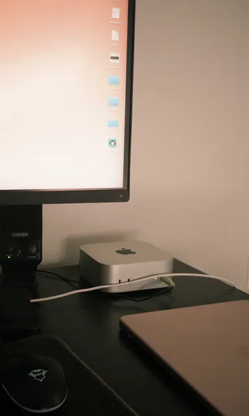 Serendipiware workspace with a monitor and Mac mini